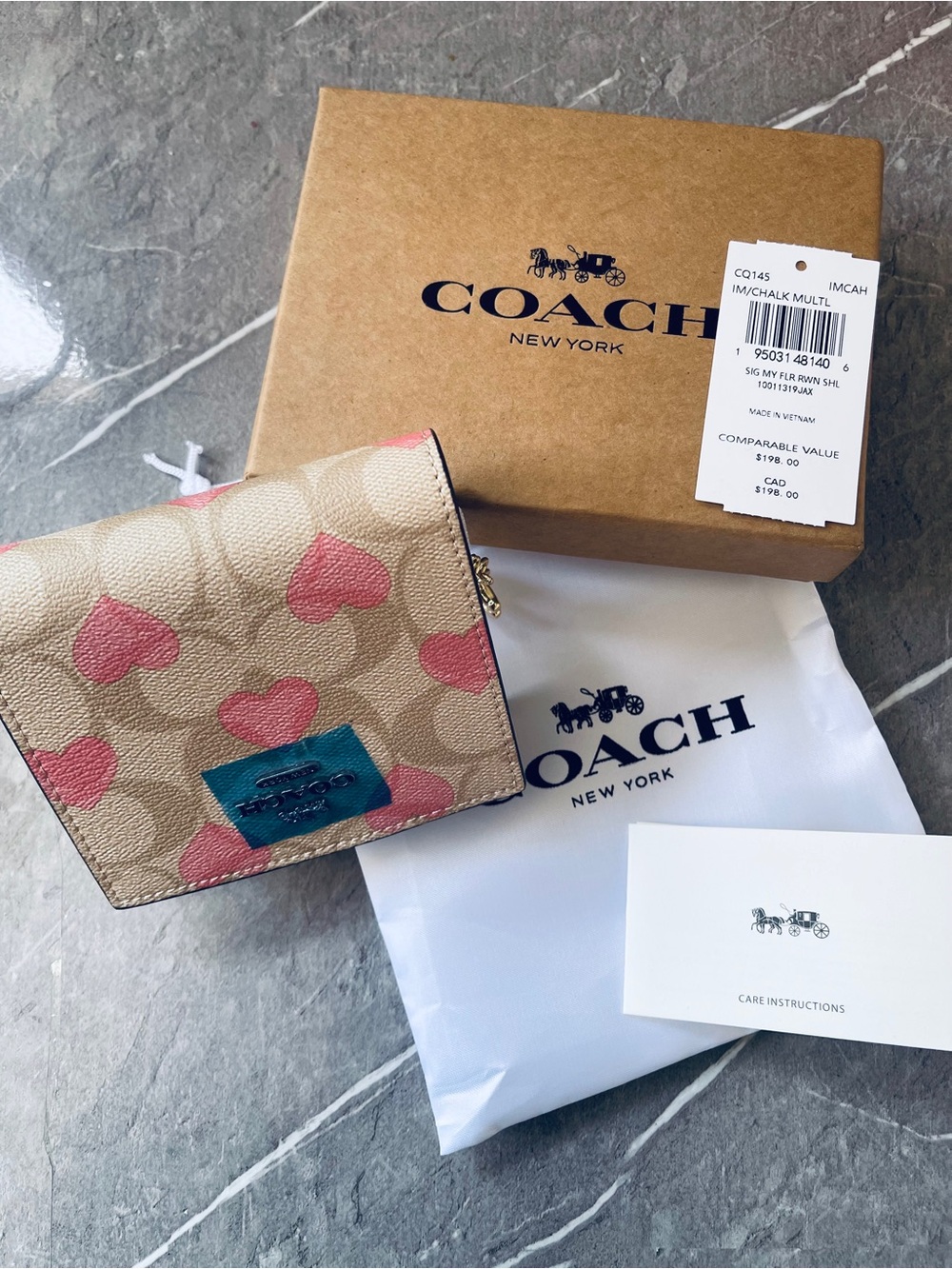 New Coach Beige Canvas Small Wallet with Pink Heart Print .